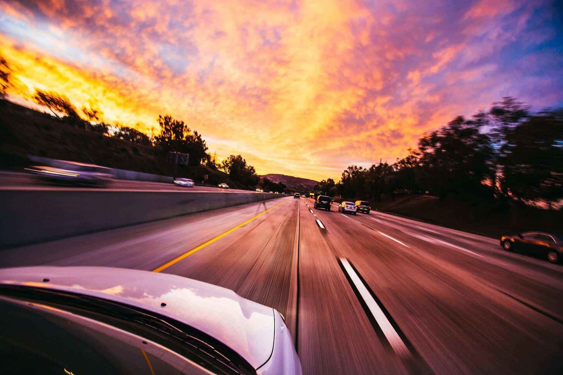 Highway traffic at sunset